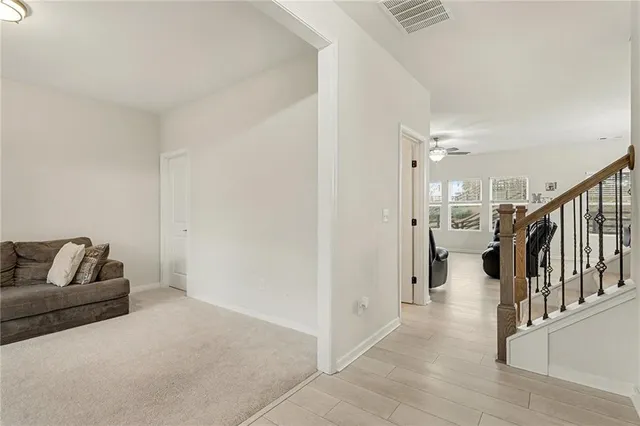 a living room with furniture and a couch