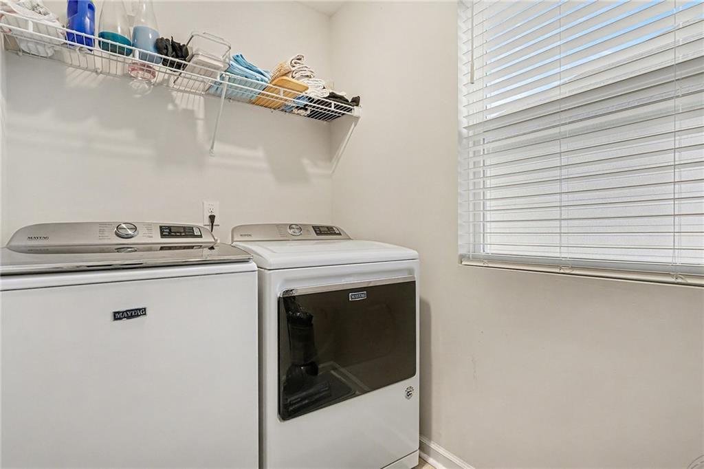 310 Coppergate Court Canton, GA 30115 - Photo 21 of 32 a utility room with dryer and washer