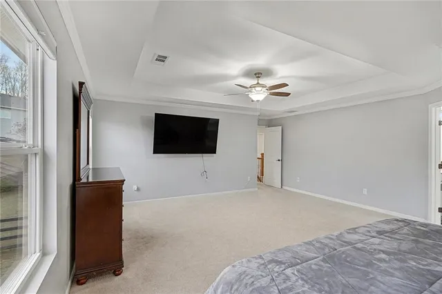 a living room with a flat screen tv