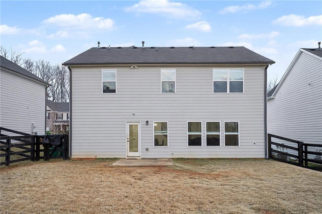 310 Coppergate Court Canton, GA 30115 - Photo 29 of 32 a front view of a house with a yard