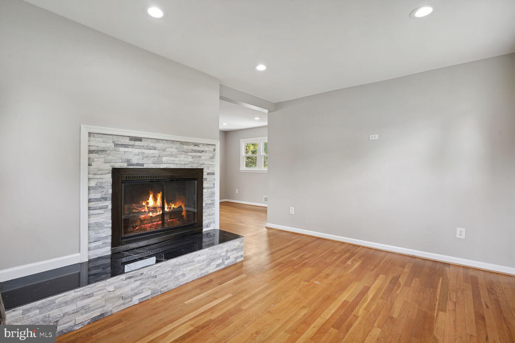 8420 Rambler Drive Adelphi, MD 20783 - Photo 5 of 29 Family Room with Fireplace & Hardwood
