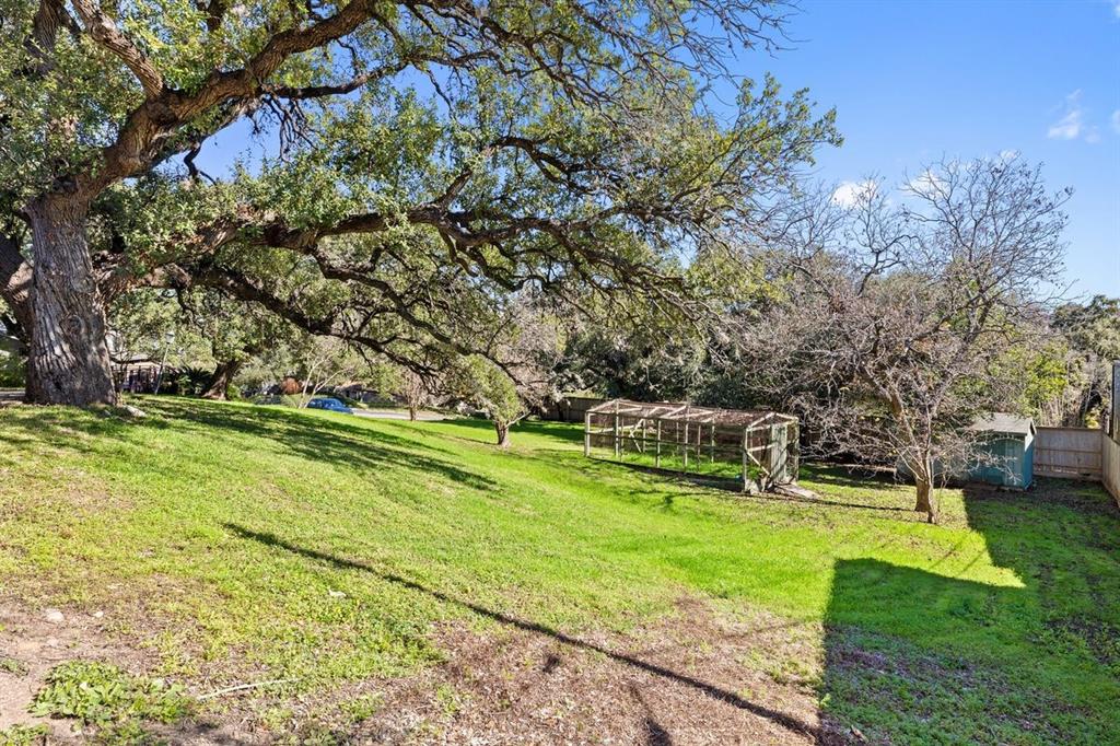 601 Sandringham Circle Austin, TX 78704 - Photo 35 of 40 a view of a house with a big yard