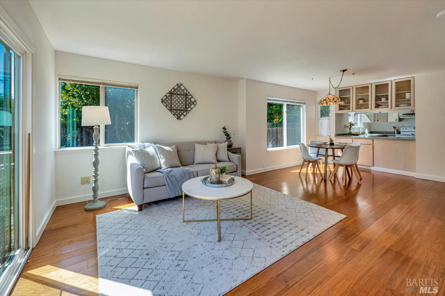 8036 Sunflower Drive Cotati, CA 94931 - Photo 1 of 1 a living room with furniture and a wooden floor
