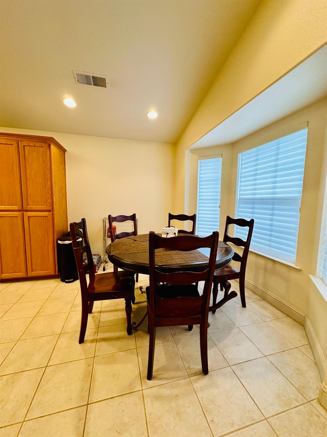 2439 Prescott Avenue Clovis, CA 93619 - Photo 4 of 25 a view of a dining room with furniture