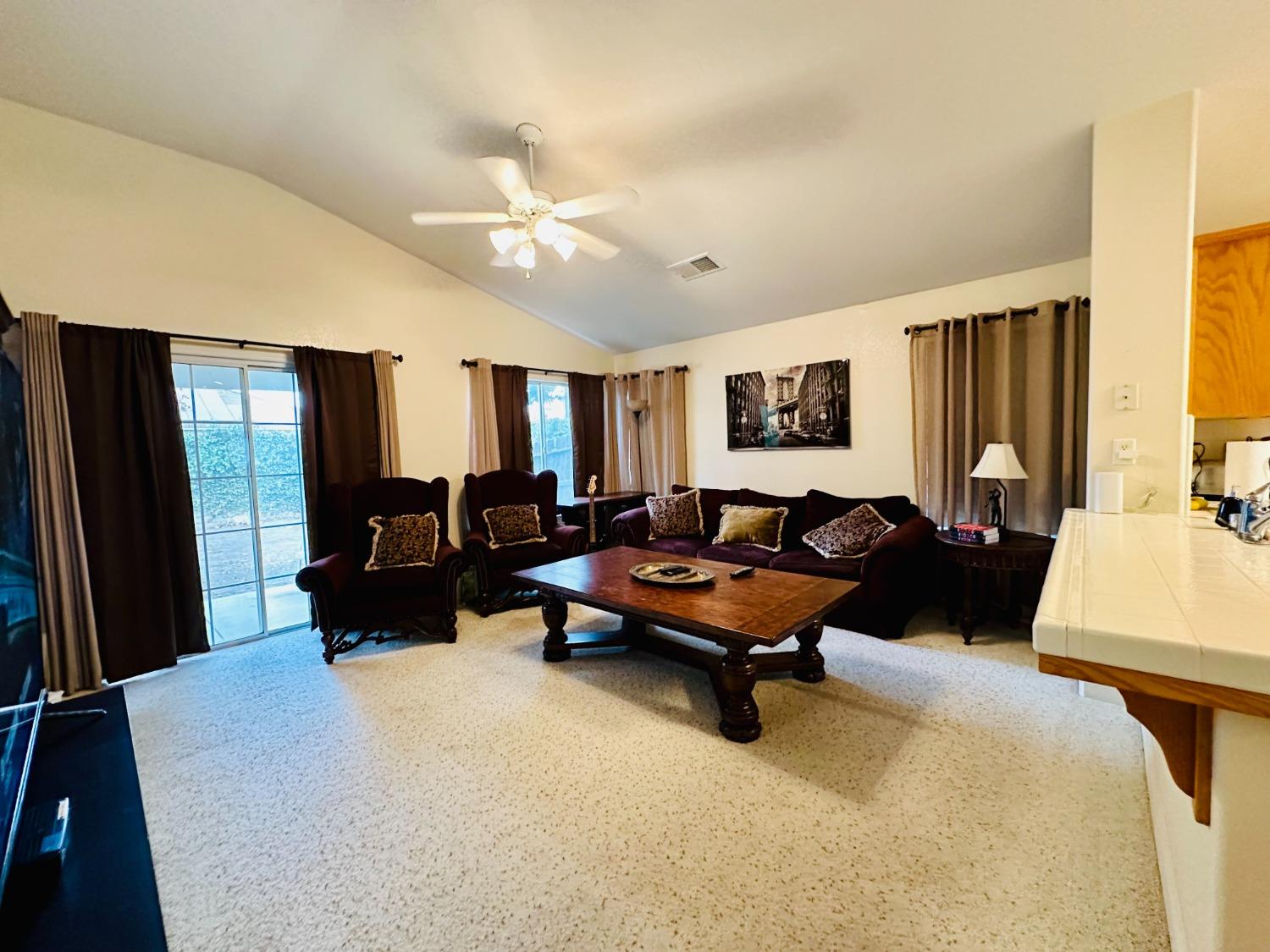 2439 Prescott Avenue Clovis, CA 93619 - Photo 7 of 25 a living room with furniture wooden floor and a window