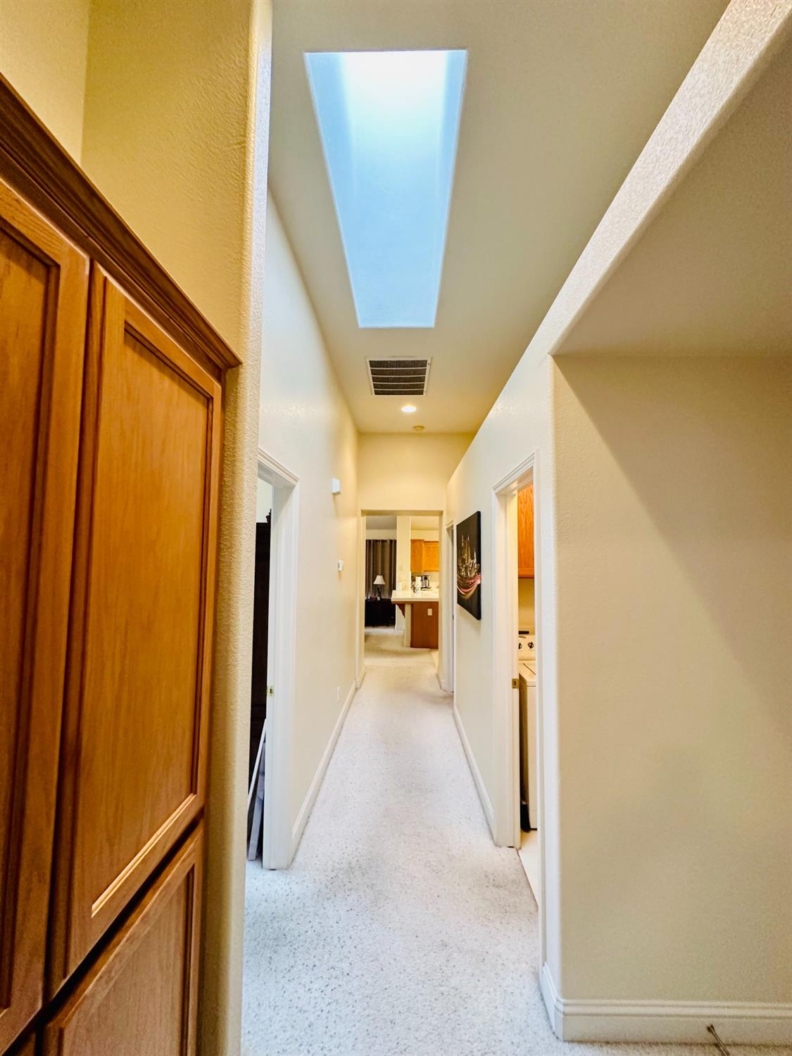 2439 Prescott Avenue Clovis, CA 93619 - Photo 9 of 25 a view of a house with a hallway