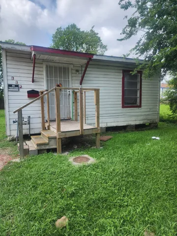 a view of a backyard with a garden