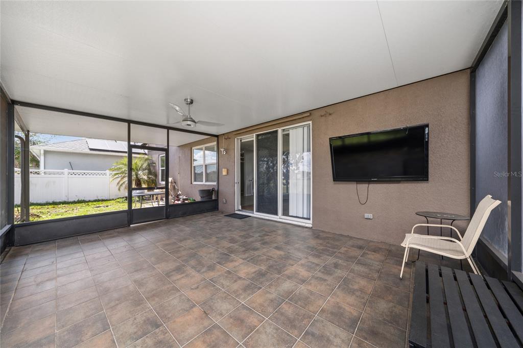 2962 White Cedar Circle Kissimmee, FL 34741 - Photo 12 of 24 a view of an empty room with a flat screen tv