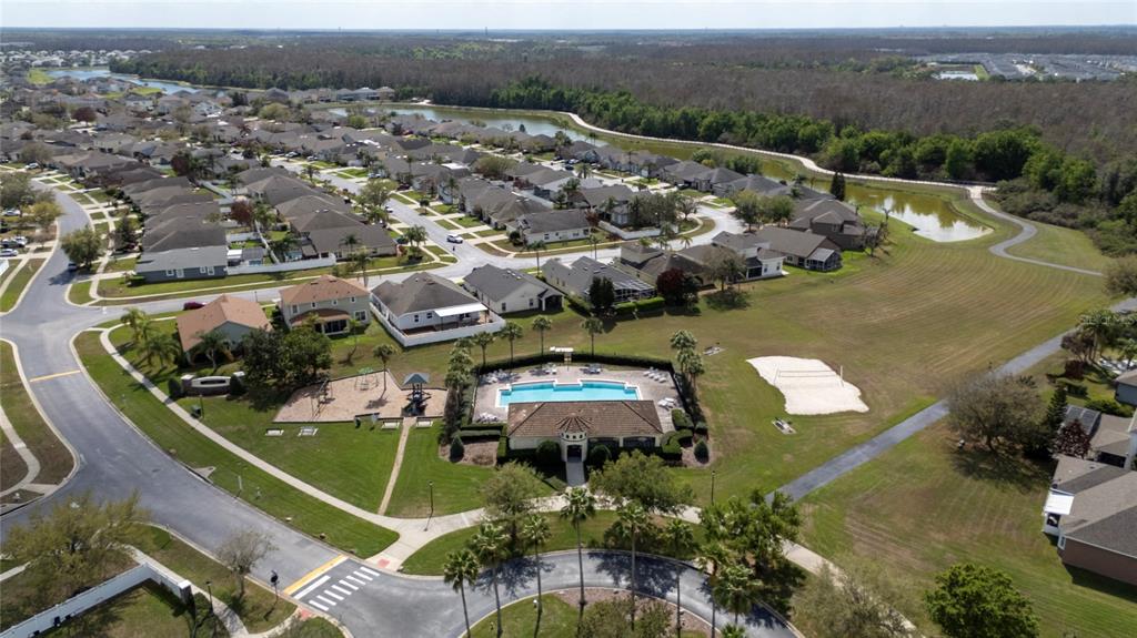 2962 White Cedar Circle Kissimmee, FL 34741 - Photo 23 of 24 an aerial view of a house with a garden