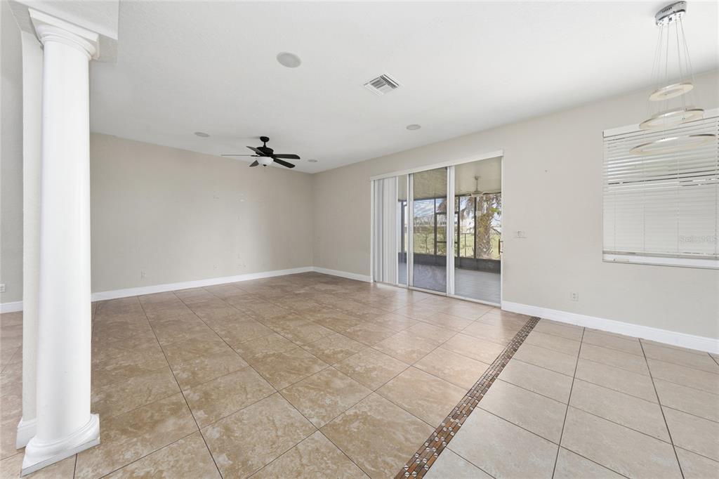 2962 White Cedar Circle Kissimmee, FL 34741 - Photo 5 of 24 a view of an empty room with a window