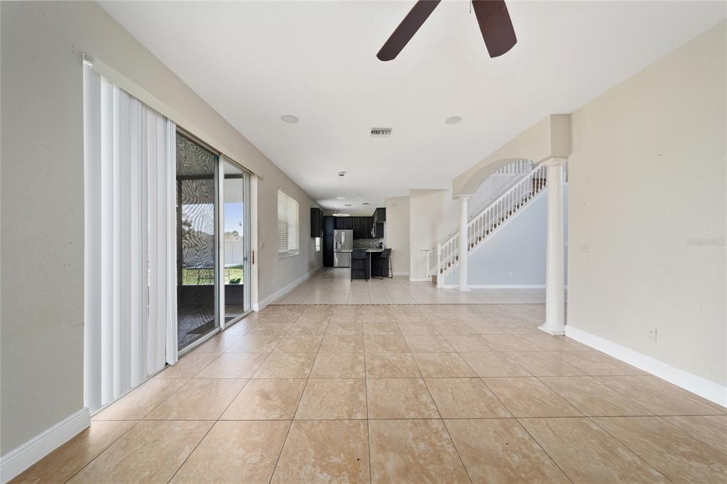 2962 White Cedar Circle Kissimmee, FL 34741 - Photo 6 of 24 a view of an empty room and window