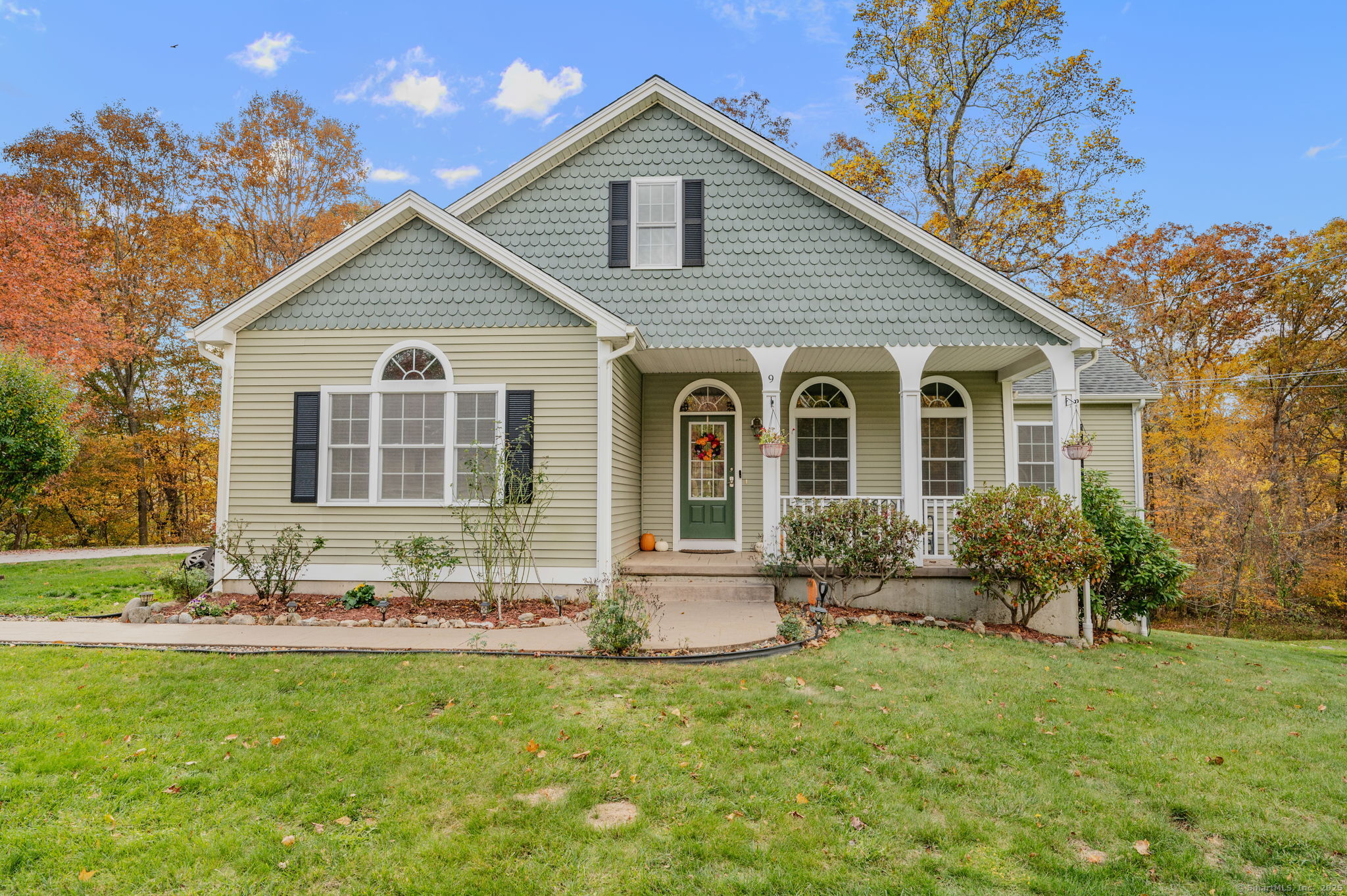 9 Reservoir View Ledyard, CT 06339 - Photo 1 of 1 a front view of house with yard and green space