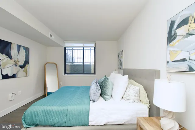 a picture of a room with a table and chairs