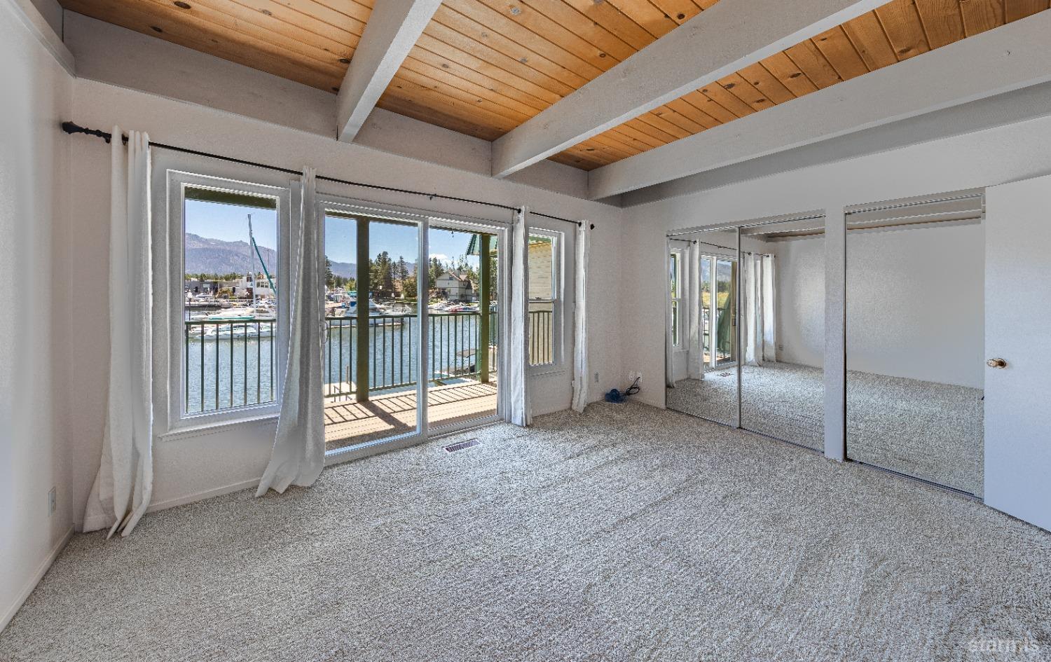 439 Ala Wai Boulevard, Unit 121 South Lake Tahoe, CA 96150 - Photo 13 of 35 an empty room with sliding glass door and shower