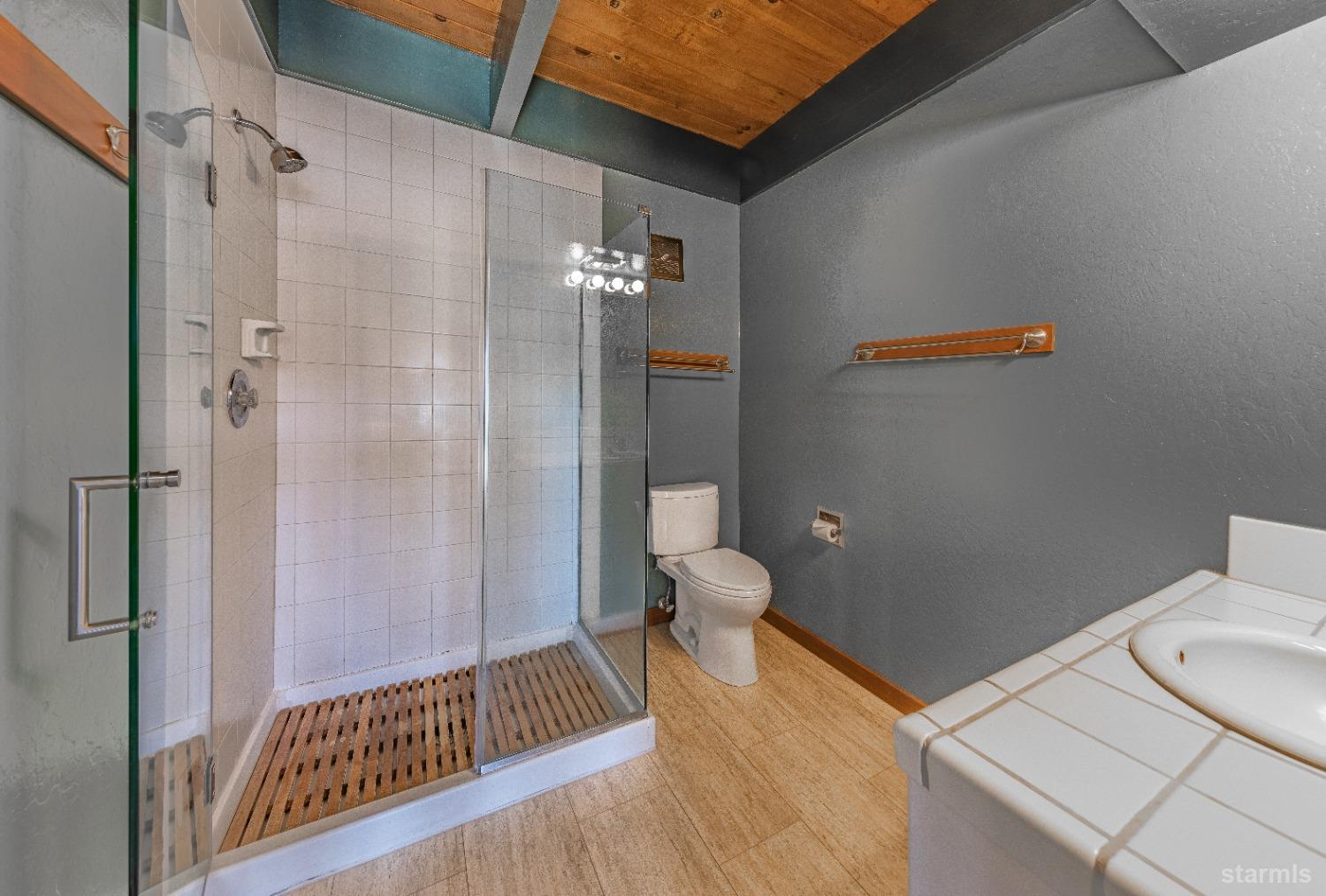 439 Ala Wai Boulevard, Unit 121 South Lake Tahoe, CA 96150 - Photo 14 of 35 a bathroom with a sink and a toilet