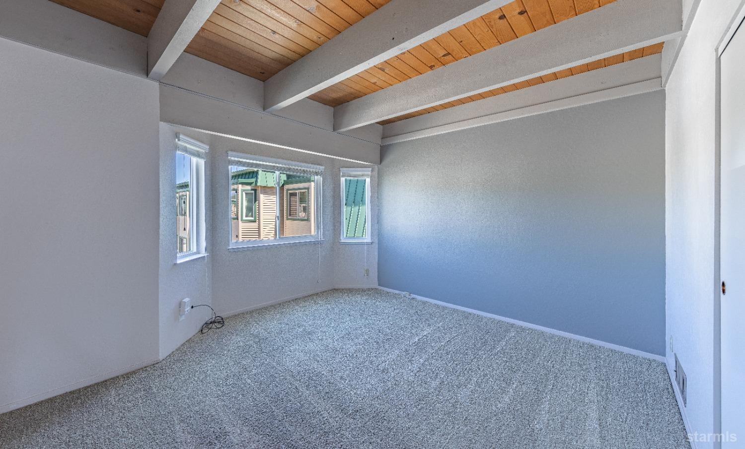 439 Ala Wai Boulevard, Unit 121 South Lake Tahoe, CA 96150 - Photo 16 of 35 a view of an empty room with a window