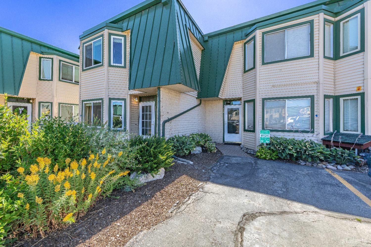 439 Ala Wai Boulevard, Unit 121 South Lake Tahoe, CA 96150 - Photo 23 of 35 a front view of a house with garden