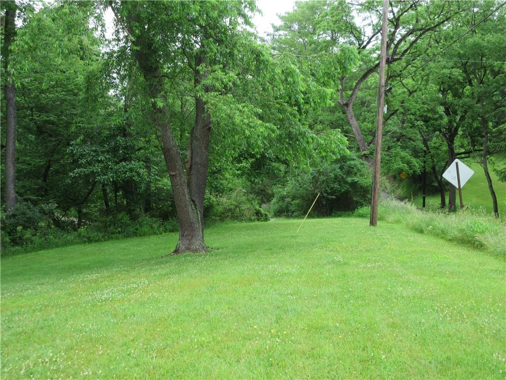 0 Valencia Road Mars, PA 16046 - Photo 5 of 5 a grassy field with trees in the background
