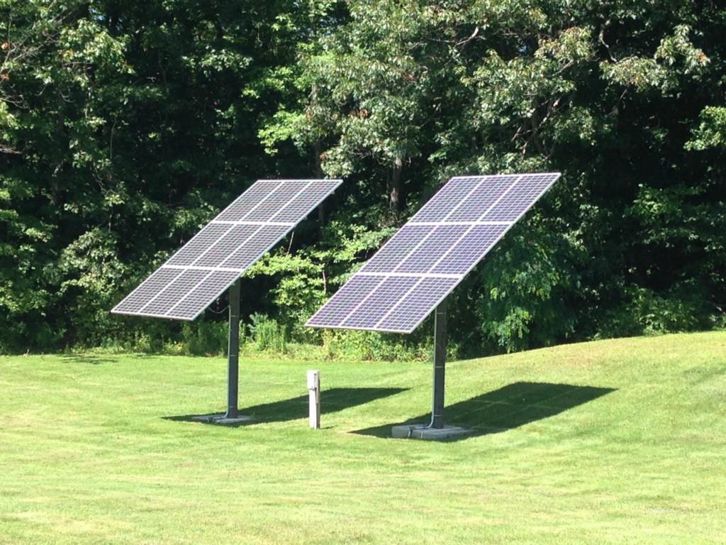 125 Sawyer Road Wells, ME 04090 - Photo 31 of 35 Solar panels in the rear side yard...