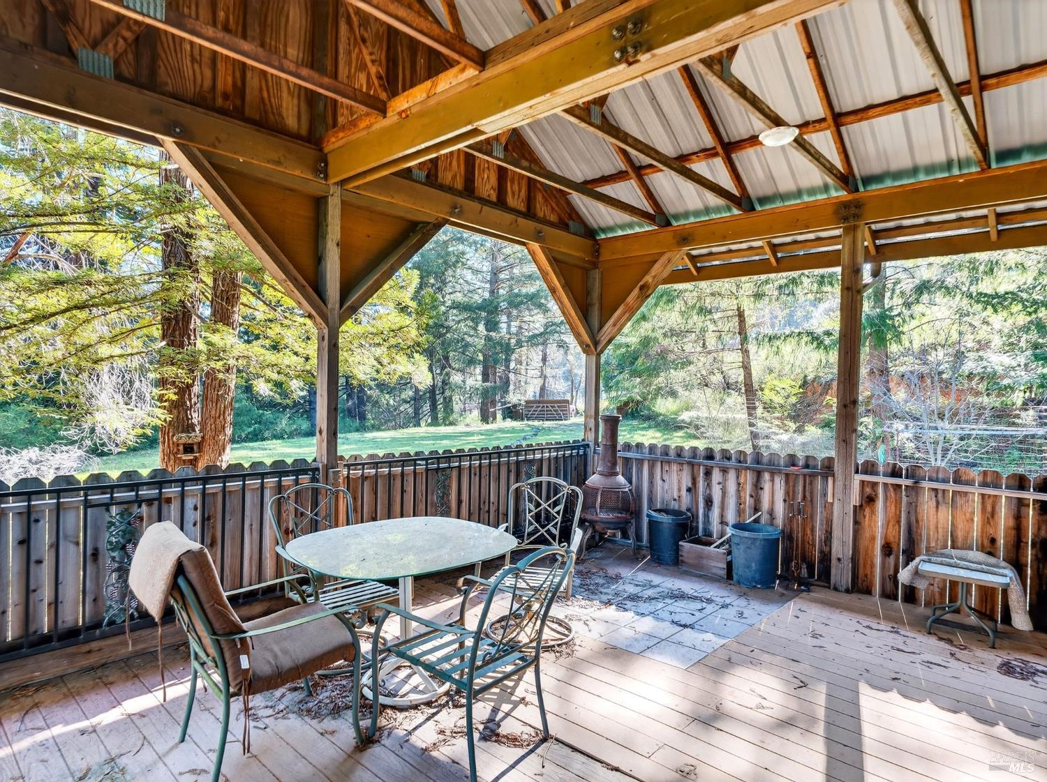 22510 Fort Ross Road Cazadero, CA 95421 - Photo 4 of 22 a view of a chair and table in the patio
