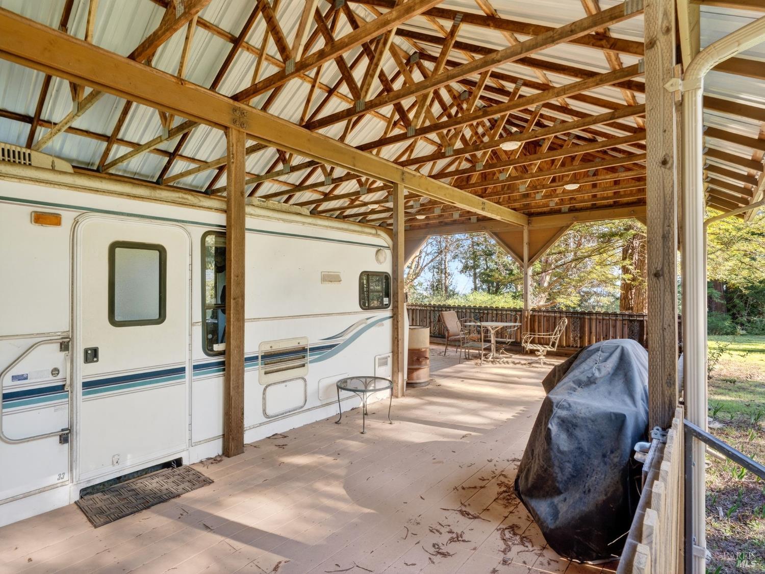 22510 Fort Ross Road Cazadero, CA 95421 - Photo 6 of 22 a view of a porch with furniture