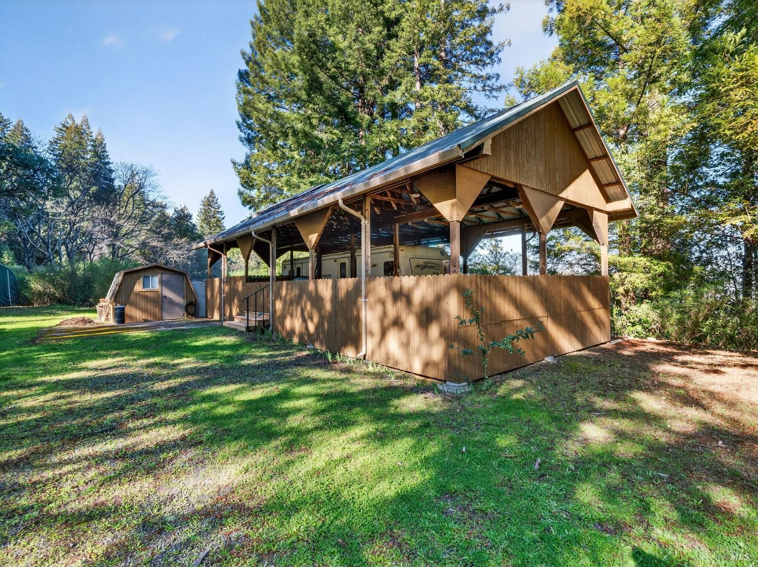 22510 Fort Ross Road Cazadero, CA 95421 - Photo 8 of 22 a view of a house with backyard and garden