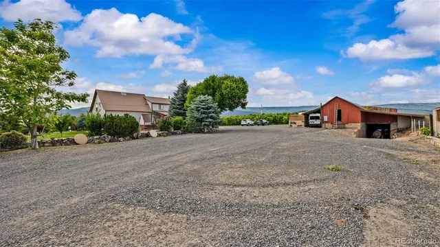 a view of house with a street