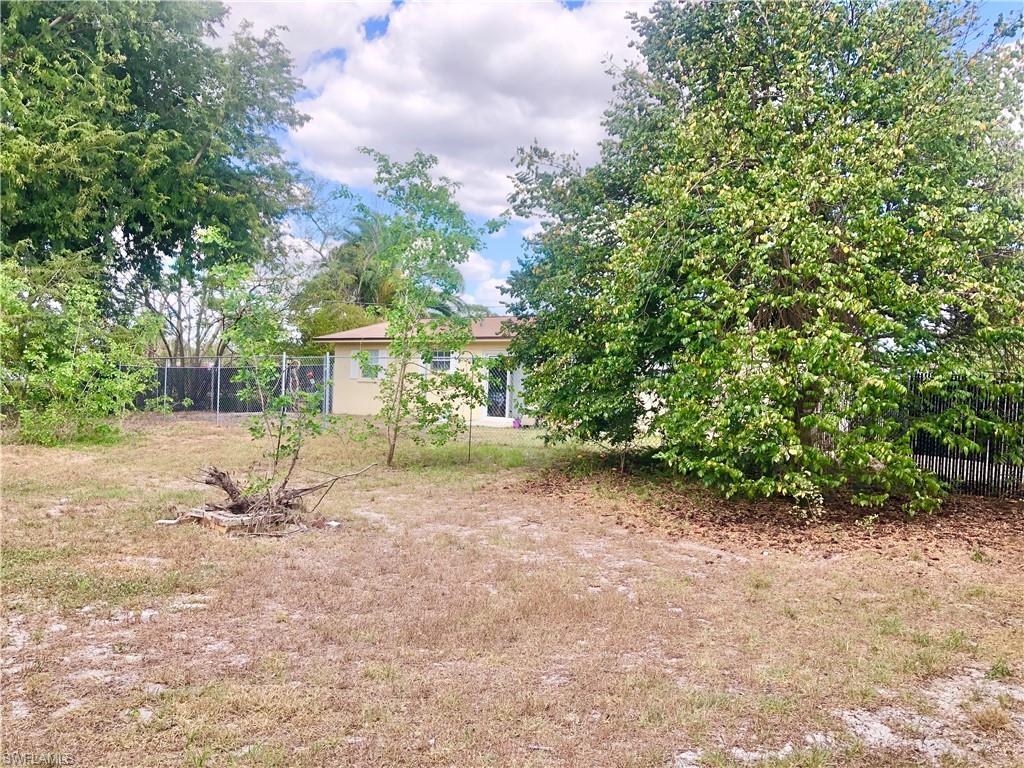 19 Massachusetts Road Lehigh Acres, FL 33936 - Photo 19 of 20 a view of outdoor space and yard