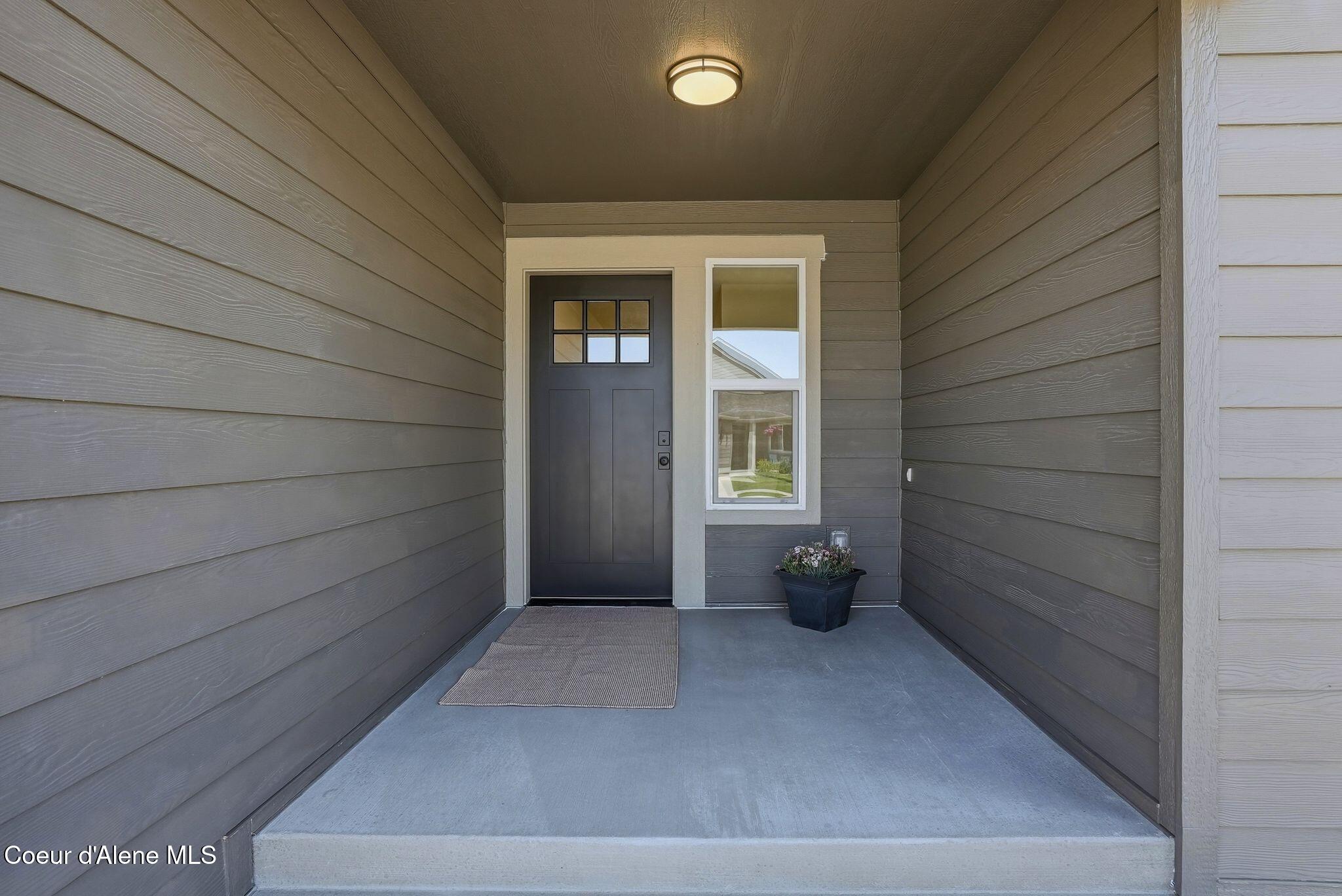 3476 Blaze Loop Post Falls, ID 83854 - Photo 2 of 33 Covered Front Entry