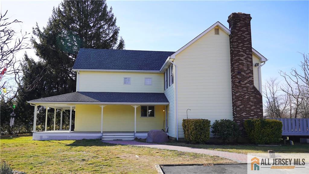 226 Gravel Hill Road Monroe Township, NJ 08831 - Photo 1 of 9 a view of swimming pool with outdoor seating