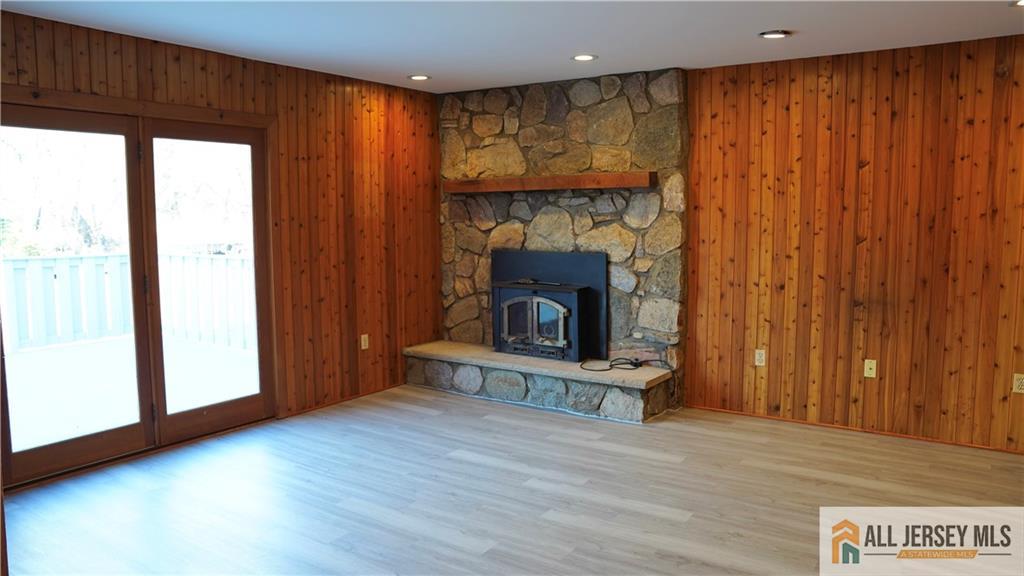 226 Gravel Hill Road Monroe Township, NJ 08831 - Photo 7 of 9 a view of a livingroom with a fireplace and window
