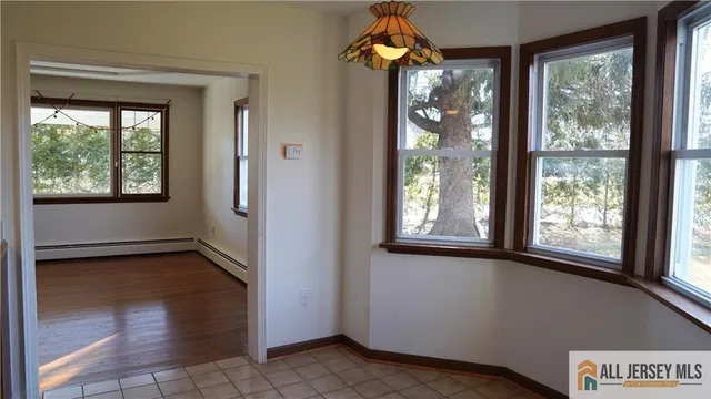 a view of a room that has a window in it