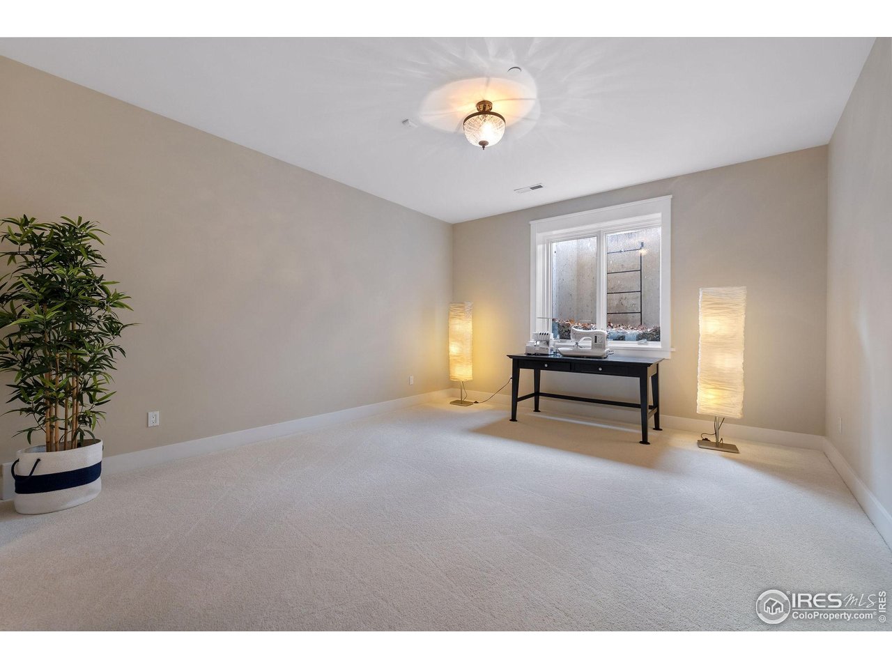 7205 Rustic Trail Boulder, CO 80301 - Photo 46 of 49 a view of an empty room with a window