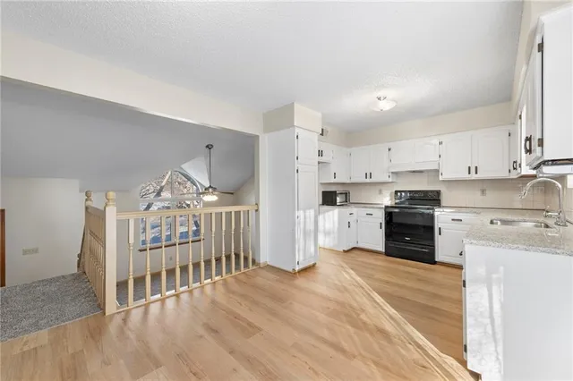 $295,000 | 725 Northeast Lyon Drive, Lee's Summit, MO 64086