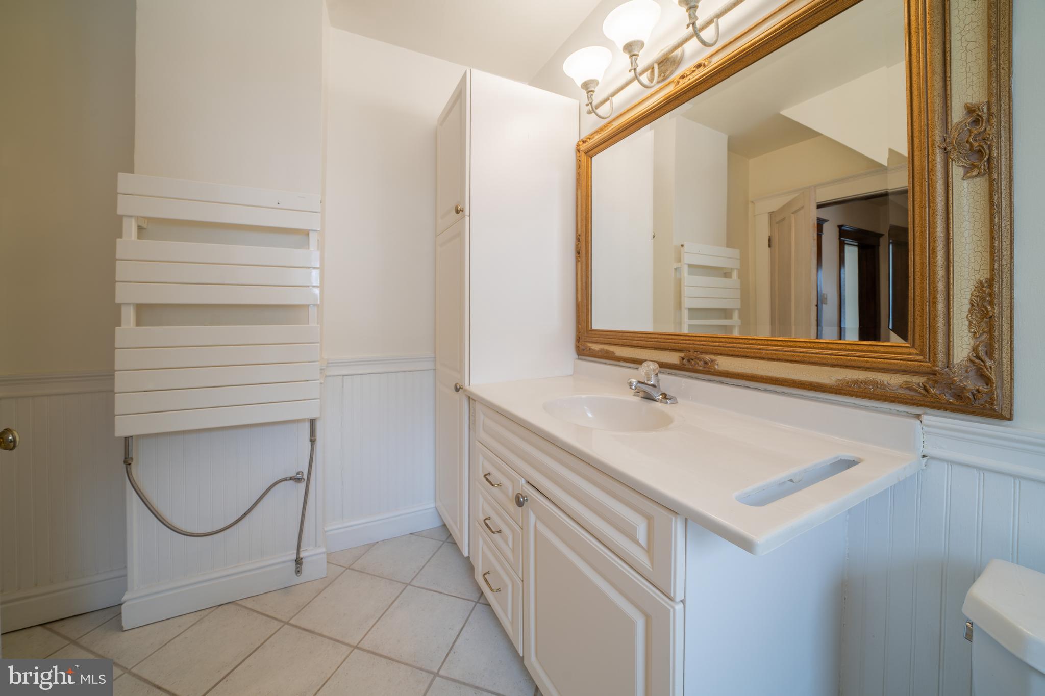 501 Warren Street Cumberland, MD 21502 - Photo 36 of 72 Towel Warmer and cabinets