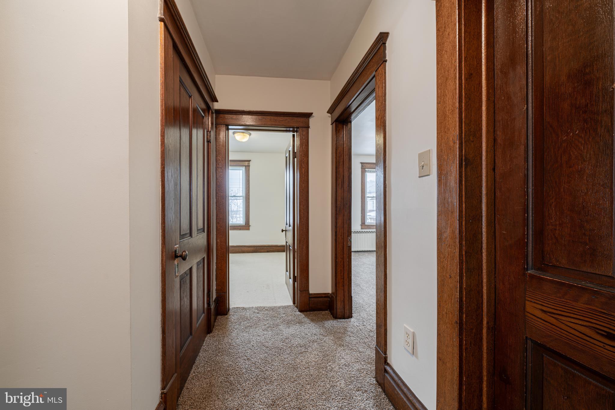 501 Warren Street Cumberland, MD 21502 - Photo 43 of 72 Second Floor hallway leading to 2nd and 3rd beds