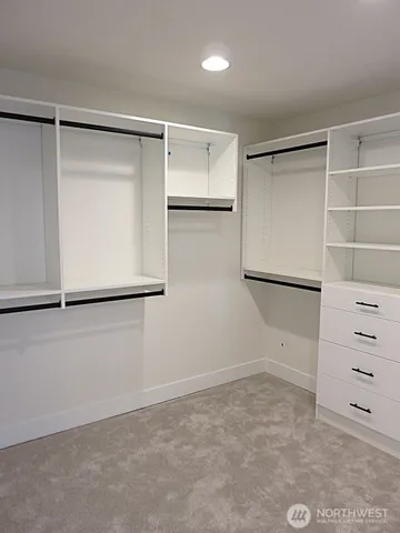 a view of an empty walk in closet