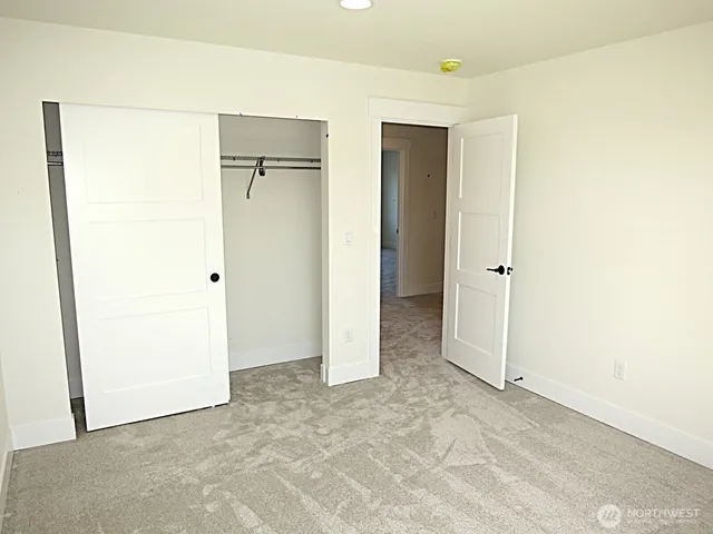 an empty room with closet