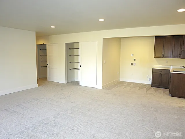 a view of a kitchen with a sink