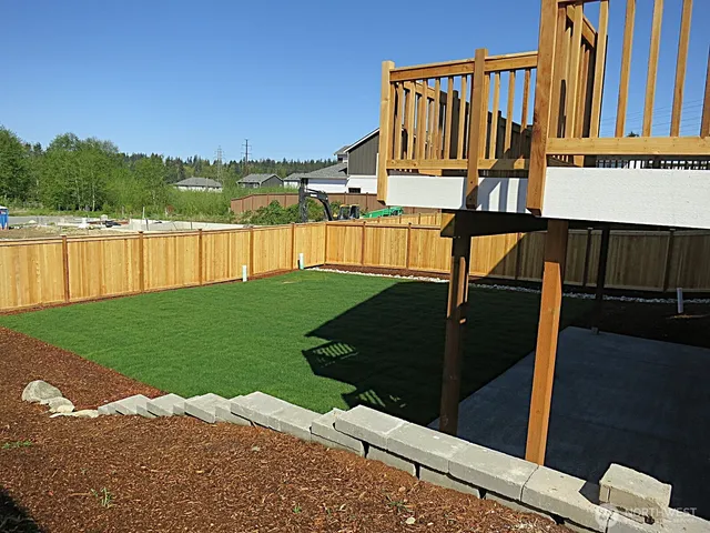 a view of swimming pool with seating area and hardwood floor