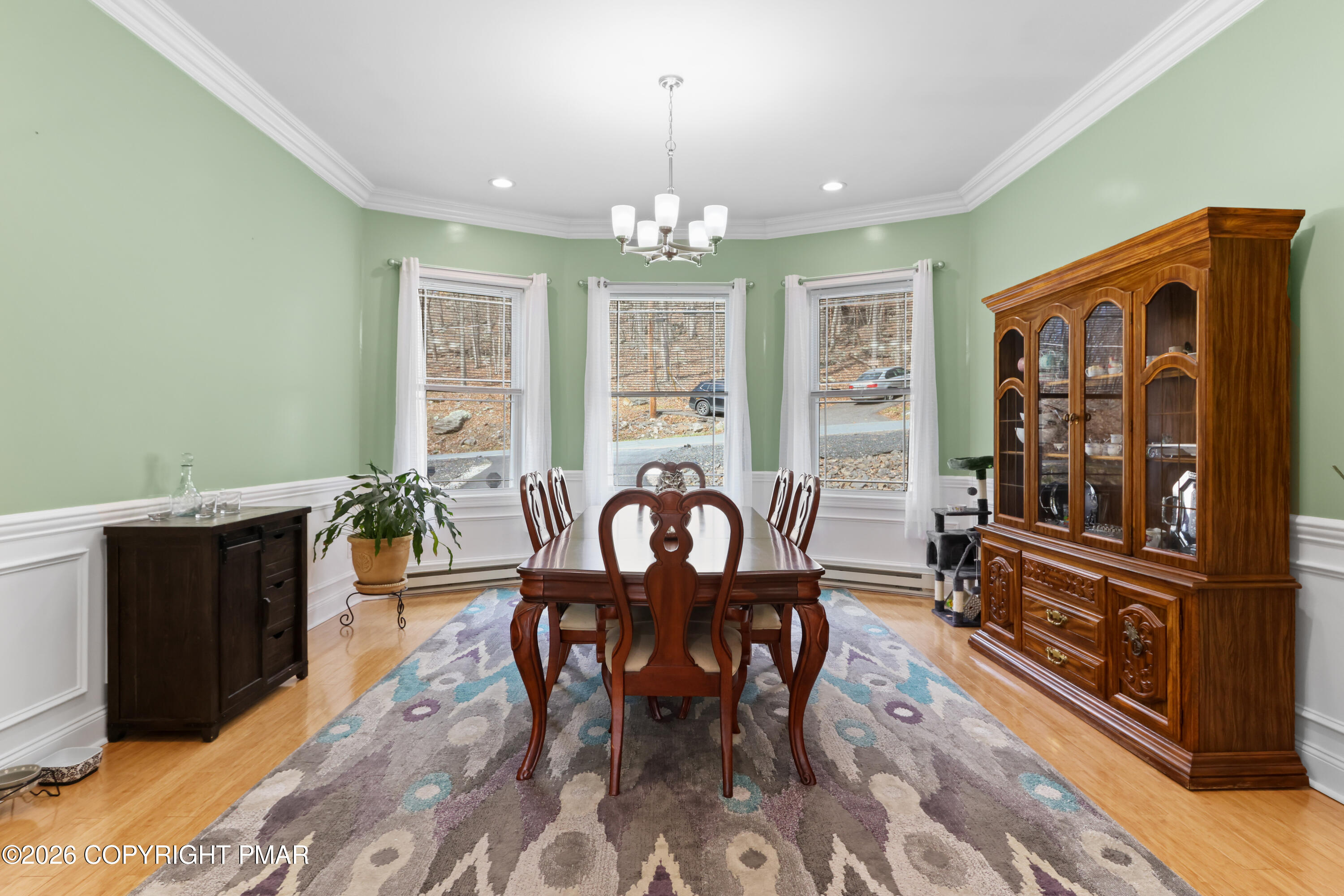 1007 Hampstead Road Bushkill, PA 18324 - Photo 13 of 68 a view of a a dining room with furniture window and wooden floor