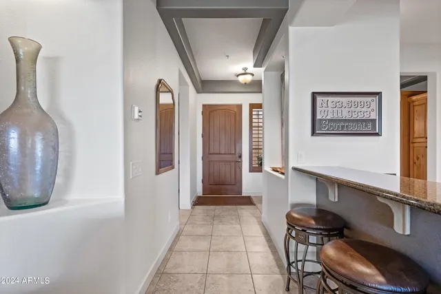 a kitchen with granite countertop a stove and a sink