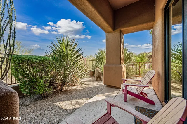 a spacious bedroom with a bed and window