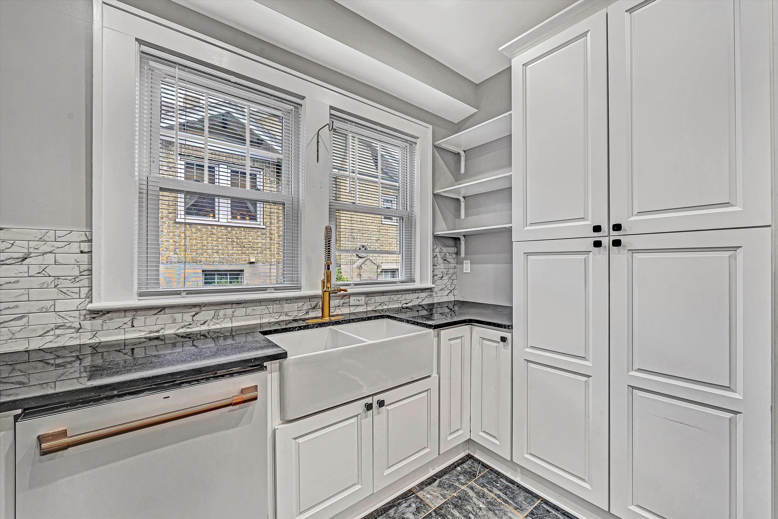 1725 Arlington Road Southwest Roanoke, VA 24015 - Photo 14 of 44 a view of a kitchen sink and cabinets