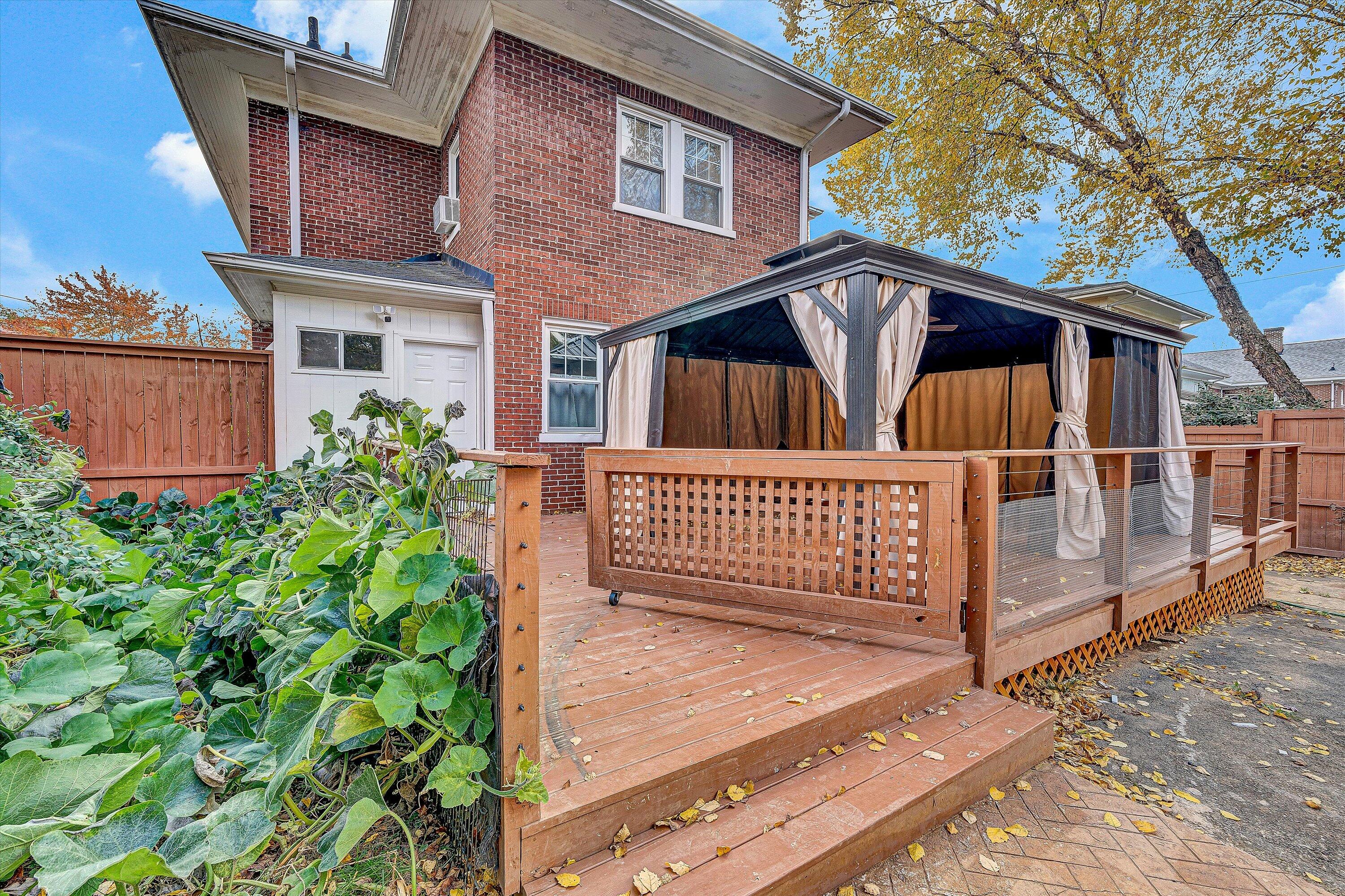 1725 Arlington Road Southwest Roanoke, VA 24015 - Photo 39 of 44 a view of a house with wooden fence next to a yard