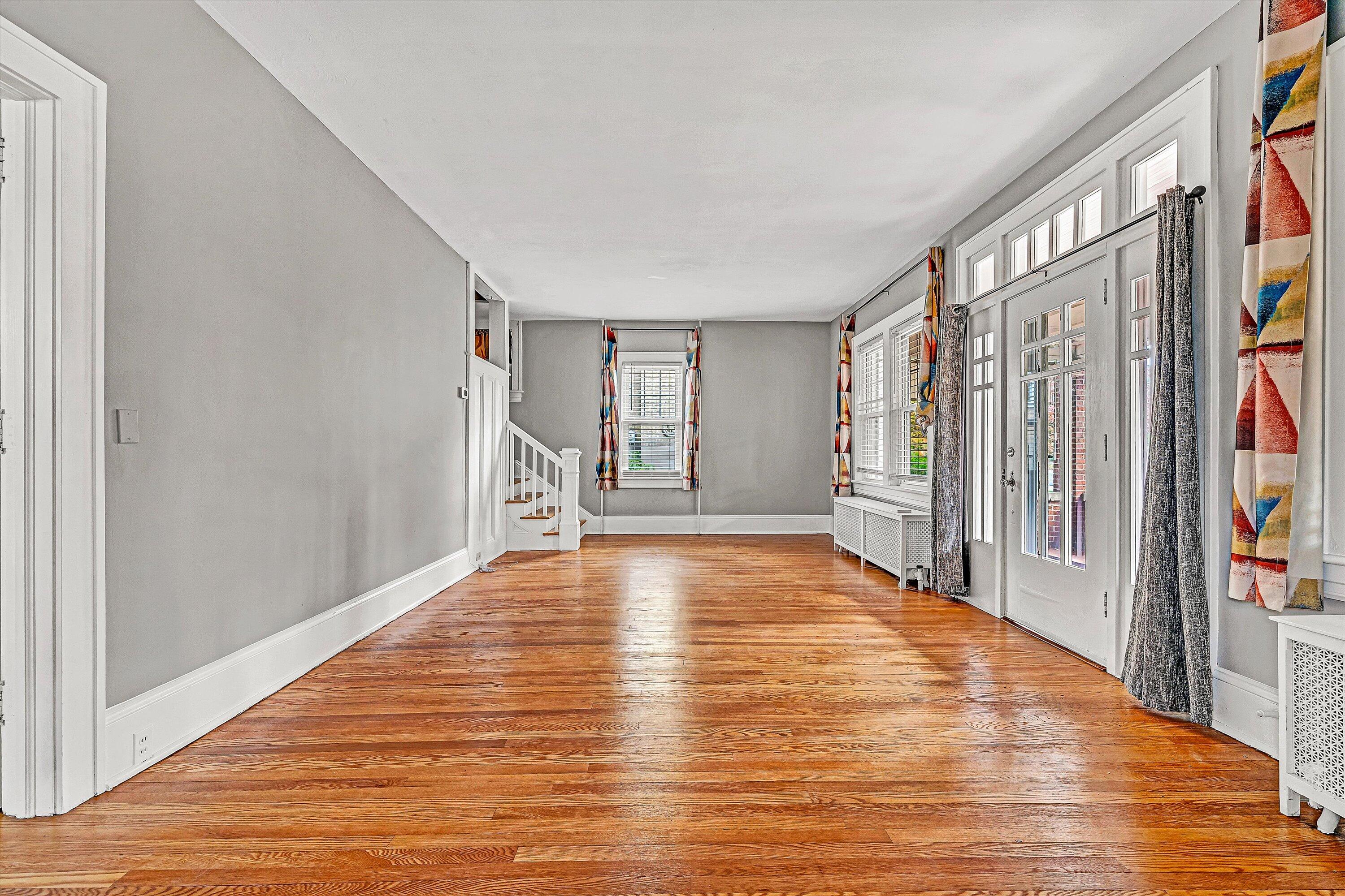 1725 Arlington Road Southwest Roanoke, VA 24015 - Photo 7 of 44 a view of an empty room with wooden floor