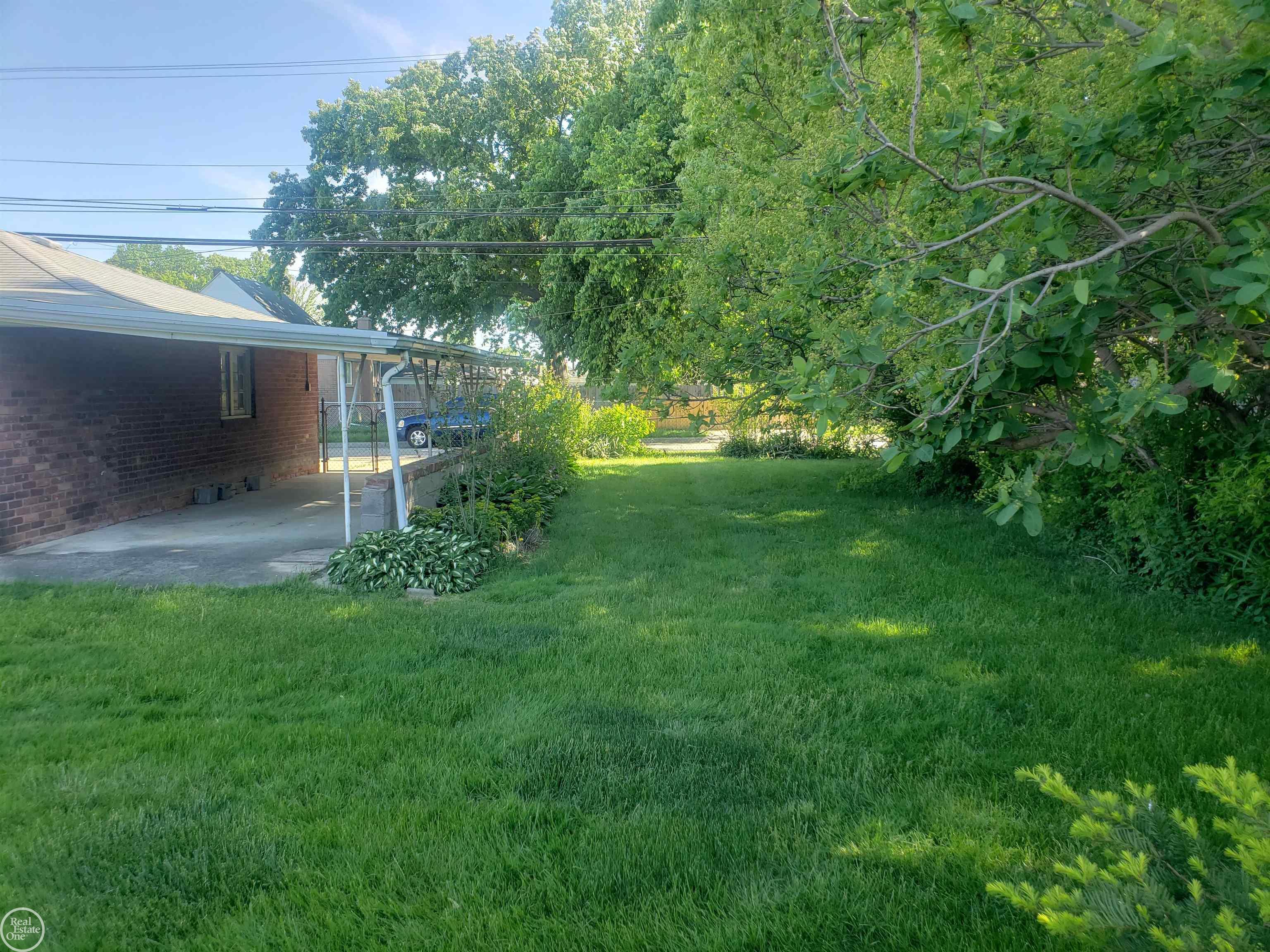 23709 Roxana Avenue Eastpointe, MI 48021 - Photo 25 of 25 Backyard by carport