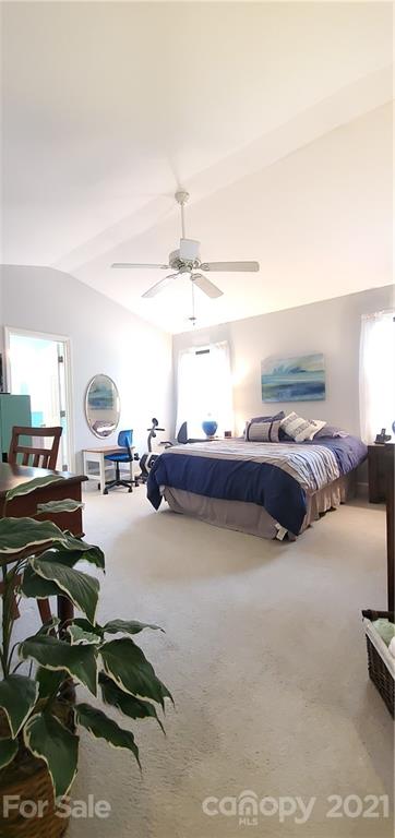 11647 Tucker Field Road Midland, NC 28107 - Photo 14 of 30 a bedroom with furniture and a window