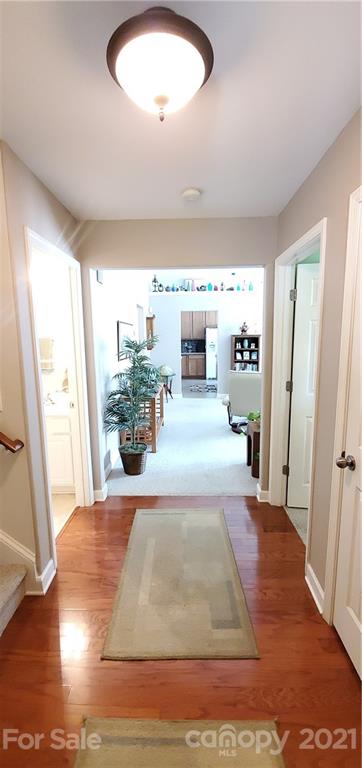 11647 Tucker Field Road Midland, NC 28107 - Photo 3 of 30 a living room with furniture large window and wooden floor