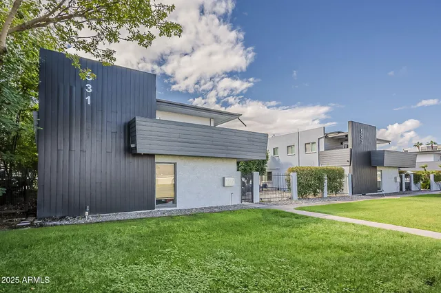 a house view with a garden space